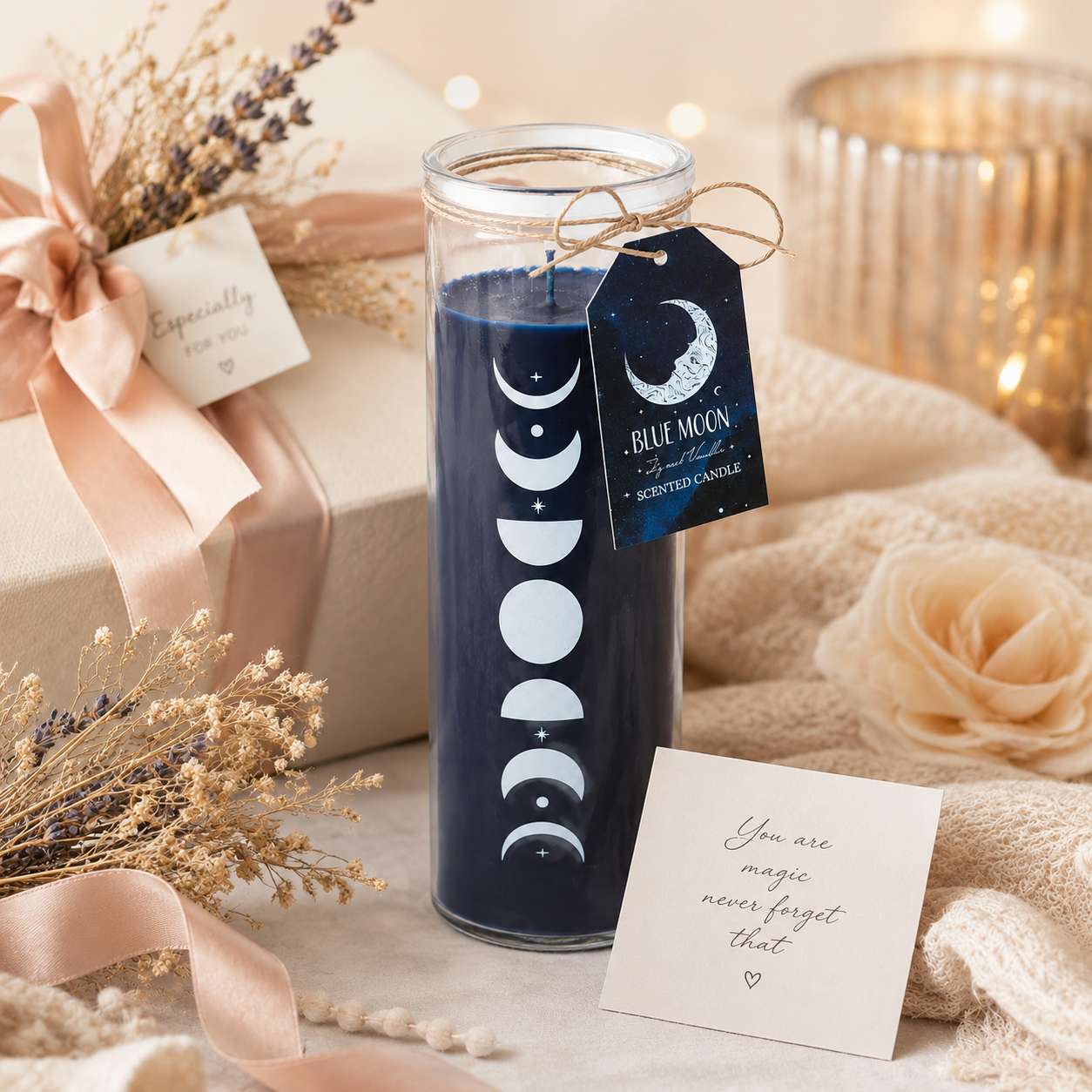 Blue moon candle with decorative label and card on a soft surface